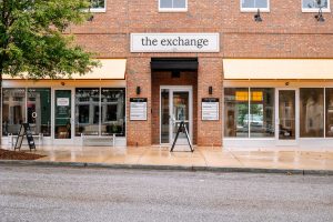 Glass Storefront of the Exchange in Patrick Square Clemson SC