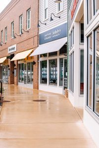 Patrick Square - Sidewalk view of Glass storefronts