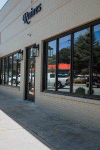outside entrance of raines complete