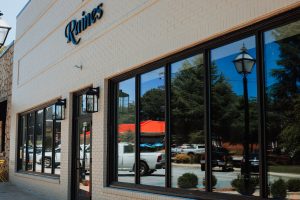 outside front entrance of raines complete