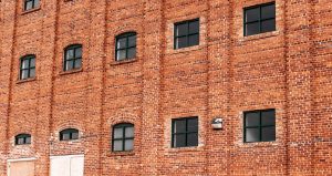 Large glass windows on historic commercial building